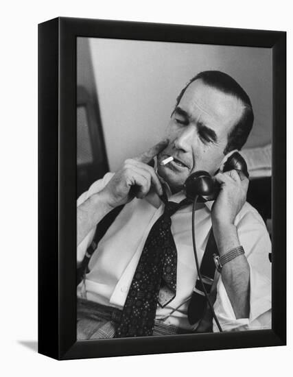News Commentator, Edward R. Murrow with cigarette in mouth, tie loose, resting in his chair-Lisa Larsen-Framed Premier Image Canvas
