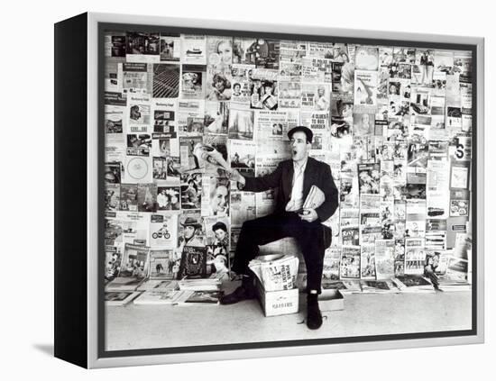 Newspaper Salesman, c.1960-English Photographer-Framed Premier Image Canvas