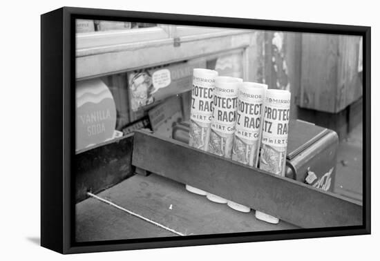 Newspapers for sale at a grocery, 324 East 61st Street, New York City, 1938-Walker Evans-Framed Premier Image Canvas