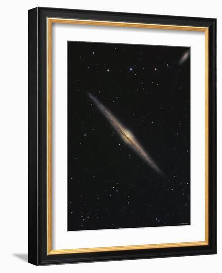 NGC 4565 is an Edge-On Barred Spiral Galaxy in the Constellation Coma Berenices-Stocktrek Images-Framed Photographic Print