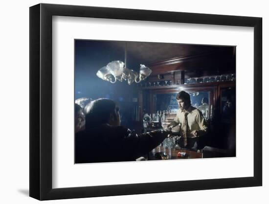 Nhl Boston Bruin Player Derek Sanderson Bartending at His Favorite Boston Bar, 1971-Art Rickerby-Framed Photographic Print