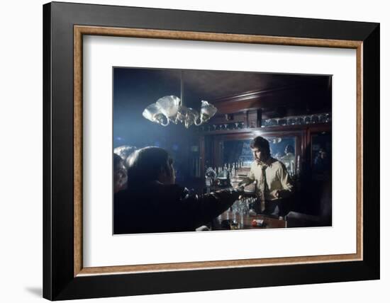 Nhl Boston Bruin Player Derek Sanderson Bartending at His Favorite Boston Bar, 1971-Art Rickerby-Framed Photographic Print