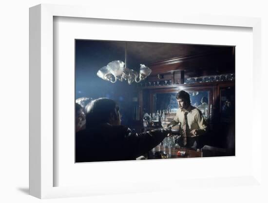 Nhl Boston Bruin Player Derek Sanderson Bartending at His Favorite Boston Bar, 1971-Art Rickerby-Framed Photographic Print