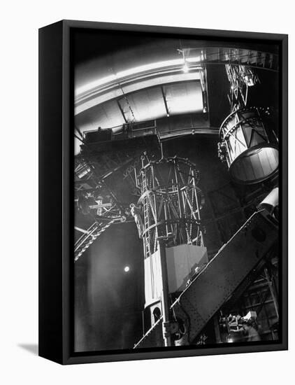 Night Assistant Climbing Down Side of 100-Inch Telescope at Mount Wilson Observatory-Margaret Bourke-White-Framed Premier Image Canvas