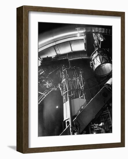 Night Assistant Climbing Down Side of 100-Inch Telescope at Mount Wilson Observatory-Margaret Bourke-White-Framed Photographic Print