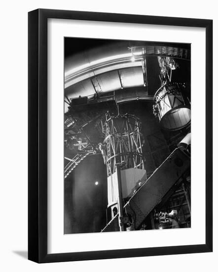 Night Assistant Climbing Down Side of 100-Inch Telescope at Mount Wilson Observatory-Margaret Bourke-White-Framed Photographic Print