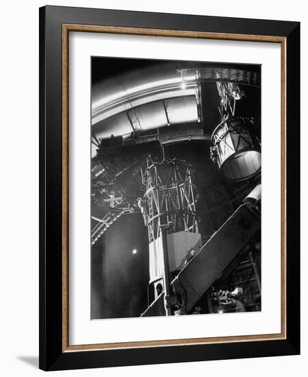 Night Assistant Climbing Down Side of 100-Inch Telescope at Mount Wilson Observatory-Margaret Bourke-White-Framed Photographic Print