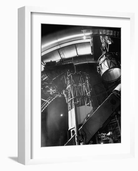 Night Assistant Climbing Down Side of 100-Inch Telescope at Mount Wilson Observatory-Margaret Bourke-White-Framed Photographic Print