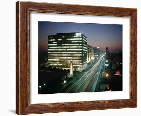 Night Photo of Car Light Trails and Traffic on Wiltshire Boulevard, Los Angeles, Califronia, 1959-Ralph Crane-Framed Photographic Print