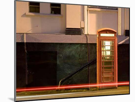 Night Shot of Uk Phonebox with Light Trails from Passing Car-Clive Nolan-Mounted Photographic Print