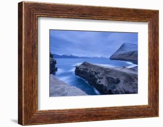 Night time descends over Gjogv on the island of Eysturoy, Faroe Islands, Denmark, Europe. Winter (A-Adam Burton-Framed Photographic Print