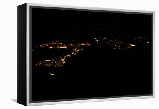 Night time satellite image of Sirte, Libya-null-Framed Premier Image Canvas