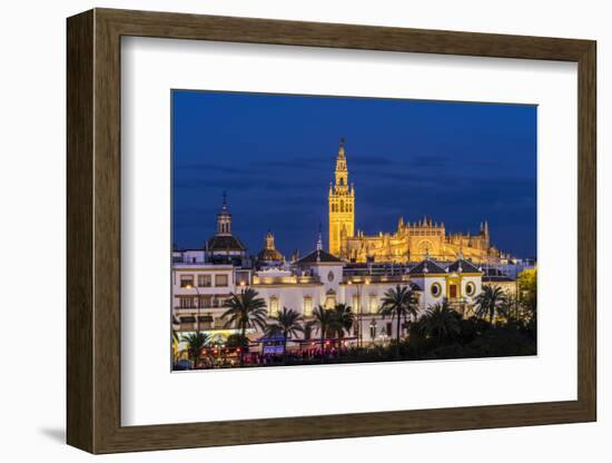 Night view of city skyline with Cathedral and Giralda bell tower, Seville, Andalusia, Spain-Stefano Politi Markovina-Framed Photographic Print