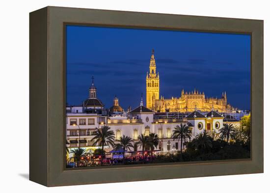 Night view of city skyline with Cathedral and Giralda bell tower, Seville, Andalusia, Spain-Stefano Politi Markovina-Framed Premier Image Canvas