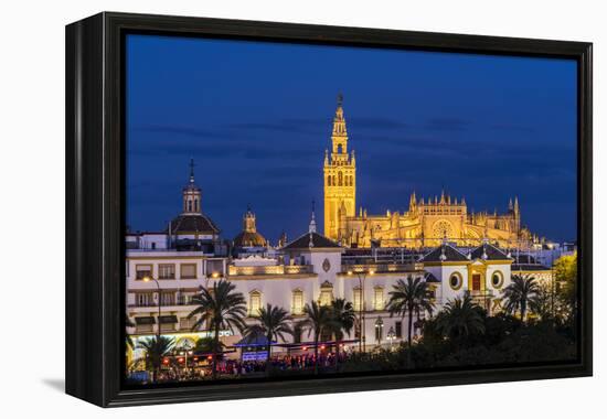 Night view of city skyline with Cathedral and Giralda bell tower, Seville, Andalusia, Spain-Stefano Politi Markovina-Framed Premier Image Canvas