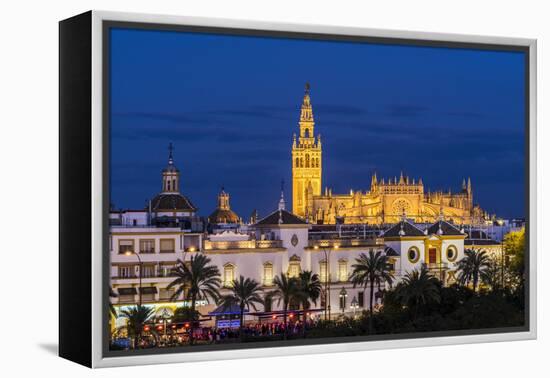 Night view of city skyline with Cathedral and Giralda bell tower, Seville, Andalusia, Spain-Stefano Politi Markovina-Framed Premier Image Canvas