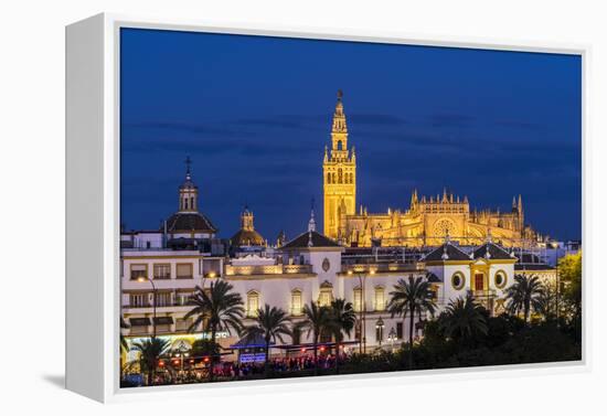 Night view of city skyline with Cathedral and Giralda bell tower, Seville, Andalusia, Spain-Stefano Politi Markovina-Framed Premier Image Canvas