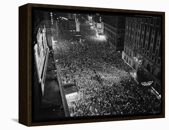 Night View of People Jammed into Times Square Celebrating the End of the War in Europe-Herbert Gehr-Framed Premier Image Canvas