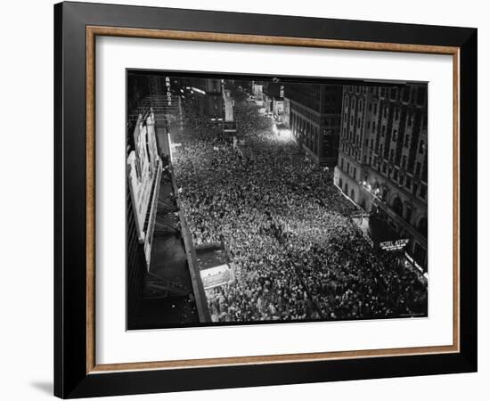 Night View of People Jammed into Times Square Celebrating the End of the War in Europe-Herbert Gehr-Framed Photographic Print