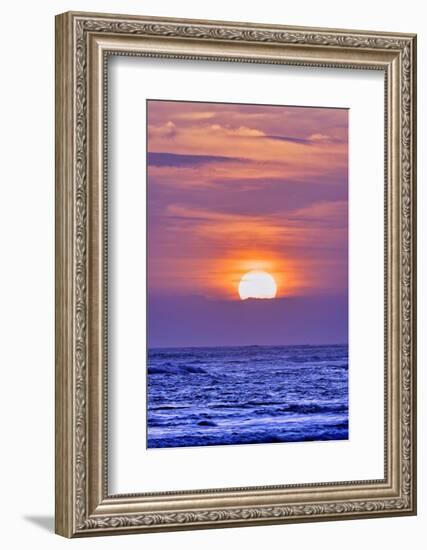 Nightly tourists gather to watch the sun setting over the Indian Ocean at Pererenan Beach, Bali.-Greg Johnston-Framed Photographic Print