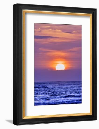 Nightly tourists gather to watch the sun setting over the Indian Ocean at Pererenan Beach, Bali.-Greg Johnston-Framed Photographic Print