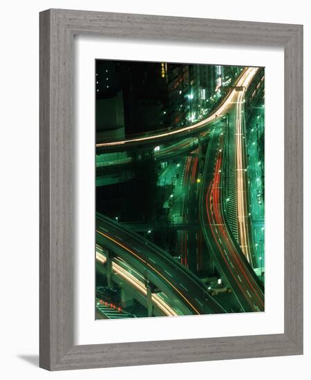 Nighttime Aerial View of Freeways and Traffic Motion, Tokyo, Japan-Nancy & Steve Ross-Framed Photographic Print