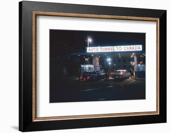 Nighttime View of the Cars at the Entrance to the Detroit-Windsor Tunnel, Detroit, Michigan, 1959-Fritz Goro-Framed Photographic Print