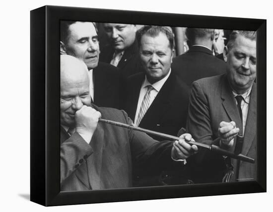 Nikita Khrushchev with Peace Pipe That Was Given to Him-Hank Walker-Framed Premier Image Canvas