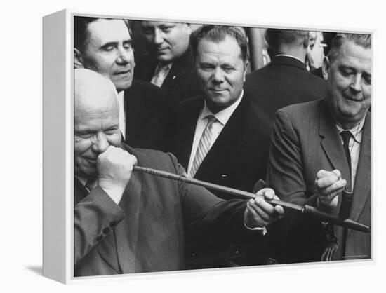 Nikita Khrushchev with Peace Pipe That Was Given to Him-Hank Walker-Framed Premier Image Canvas