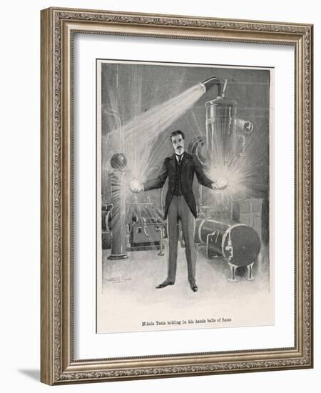 Nikola Croatian Inventor Holding Balls of "Flame" in His Bare Hands-Warwick Goble-Framed Photographic Print