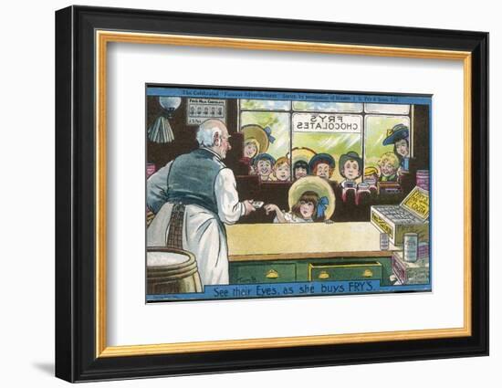 Nine Children Watch as a Lucky Little Girl Buys Herself a Bar of Fry's Chocolate-Tom Browne-Framed Photographic Print