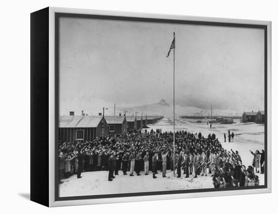 Nisei Japanese Americans Participating in Flag Saluting Ceremony at Relocation Center During WWII-Hansel Mieth-Framed Premier Image Canvas
