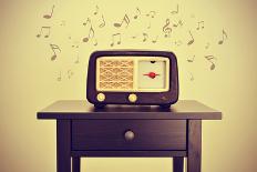 An Antique Radio Receptor on a Desk and Musical Notes, with a Retro Effect-nito-Photographic Print