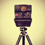 Picture of an Old Instant Camera in a Tripod with a Retro Effect-nito-Photographic Print