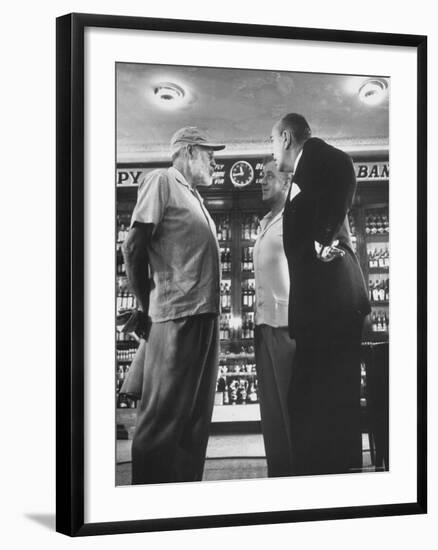 Noel Coward Chatting with Ernest Hemingway and Alec Guinness on Set Location at Sloppy Joe's Bar-Peter Stackpole-Framed Premium Photographic Print