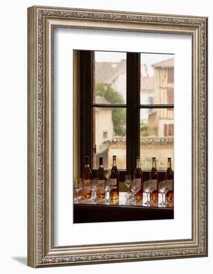 Nogaro, Gers Department, Midi-Pyrenees, France. Bottles of armagnac ready for tasting at the cel...-null-Framed Photographic Print