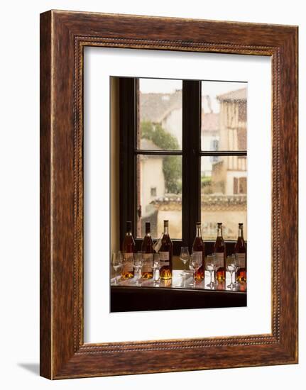 Nogaro, Gers Department, Midi-Pyrenees, France. Bottles of armagnac ready for tasting at the cel...-null-Framed Photographic Print