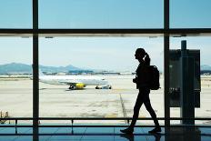 Silhouette of Young Woman Walking at Airport-Nomad Soul-Photographic Print