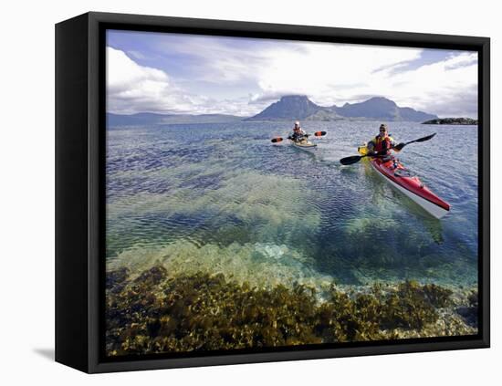 Nordland, Helgeland, Sea Kayakers Explore Calm Coastal Waters of Southern Nordland, Norway-Mark Hannaford-Framed Premier Image Canvas