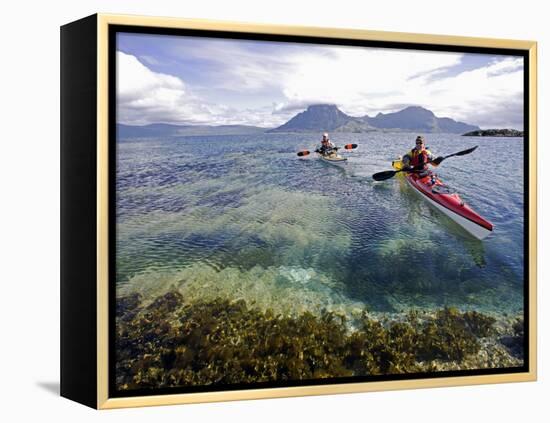 Nordland, Helgeland, Sea Kayakers Explore Calm Coastal Waters of Southern Nordland, Norway-Mark Hannaford-Framed Premier Image Canvas