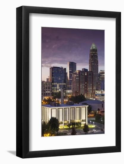 North Carolina, Charlotte, Elevated View of the City Skyline at Dusk-Walter Bibikow-Framed Photographic Print