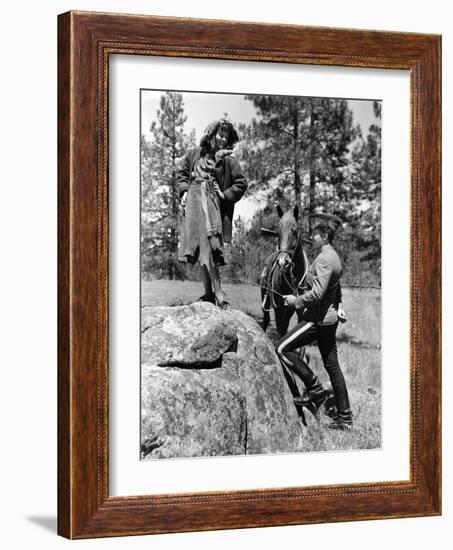 NORTH WEST MOUNTAIN POLICE, 1940 directed by CECIL B.DeMILLE Paulette Goddard and Robert Preston (b-null-Framed Photo