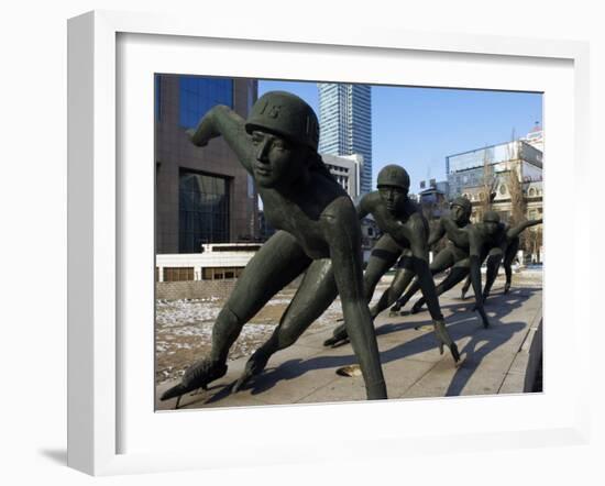 Northeast China, Heilongjiang Province, Harbin, A Statue of Female Ice Speed Skaters, China-Christian Kober-Framed Photographic Print