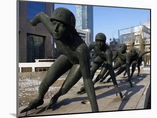 Northeast China, Heilongjiang Province, Harbin, A Statue of Female Ice Speed Skaters, China-Christian Kober-Mounted Photographic Print