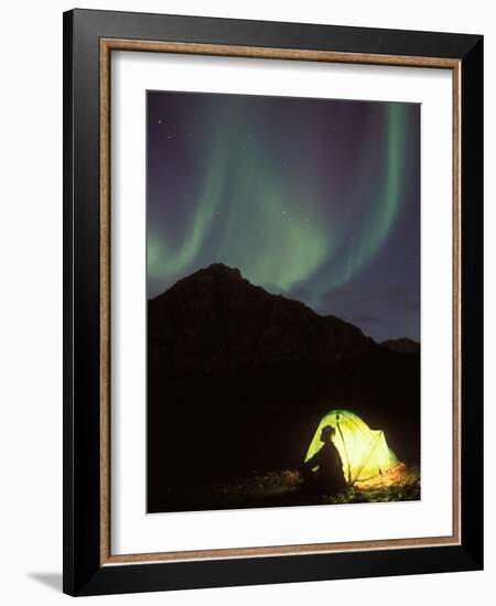 Northern Lights and Camper Outside Tent, Brooks Range, Arctic National Wildlife Refuge, Alaska, USA-Steve Kazlowski-Framed Photographic Print