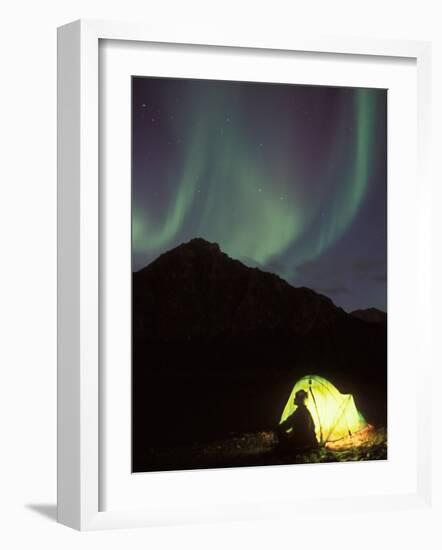 Northern Lights and Camper Outside Tent, Brooks Range, Arctic National Wildlife Refuge, Alaska, USA-Steve Kazlowski-Framed Photographic Print