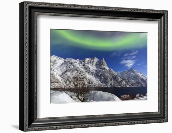 Northern Lights (Aurora Borealis) Illuminate the Snowy Peaks and the Blue Sky During a Starry Night-Roberto Moiola-Framed Photographic Print