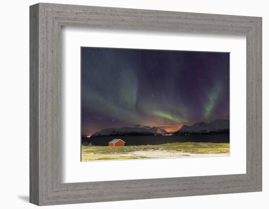 Northern Lights Illuminates the Wooden Cabin at Svensby, Lyngen Alps, Troms, Lapland, Norway-Roberto Moiola-Framed Photographic Print