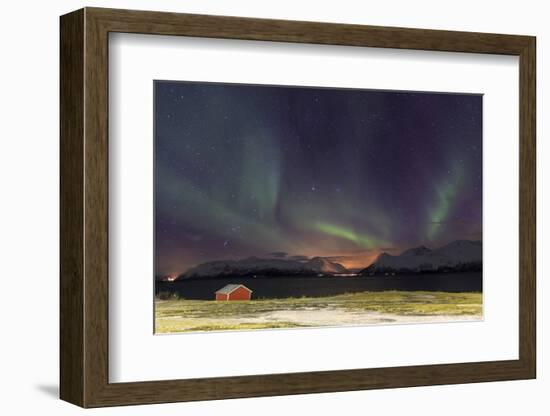 Northern Lights Illuminates the Wooden Cabin at Svensby, Lyngen Alps, Troms, Lapland, Norway-Roberto Moiola-Framed Photographic Print