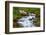 Norway, Nordland, Tysfjord. Woman sitting along Storelva, river that flows from Stetind mountain-Fredrik Norrsell-Framed Photographic Print